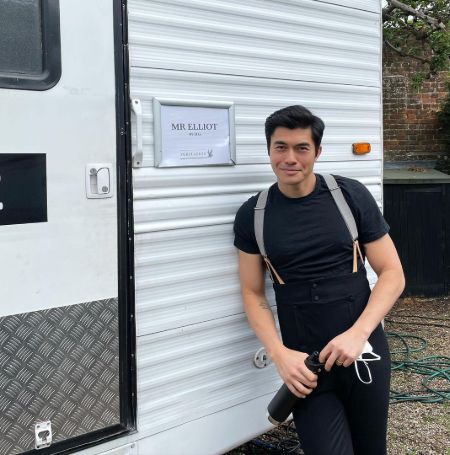 Henry Golding is shooting his new movie Persuasion.